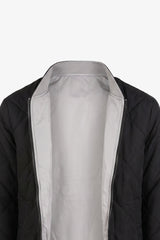 Chaqueta bomber acolchada ligera reversible 2 en 1 para hombre, color negro y beige.