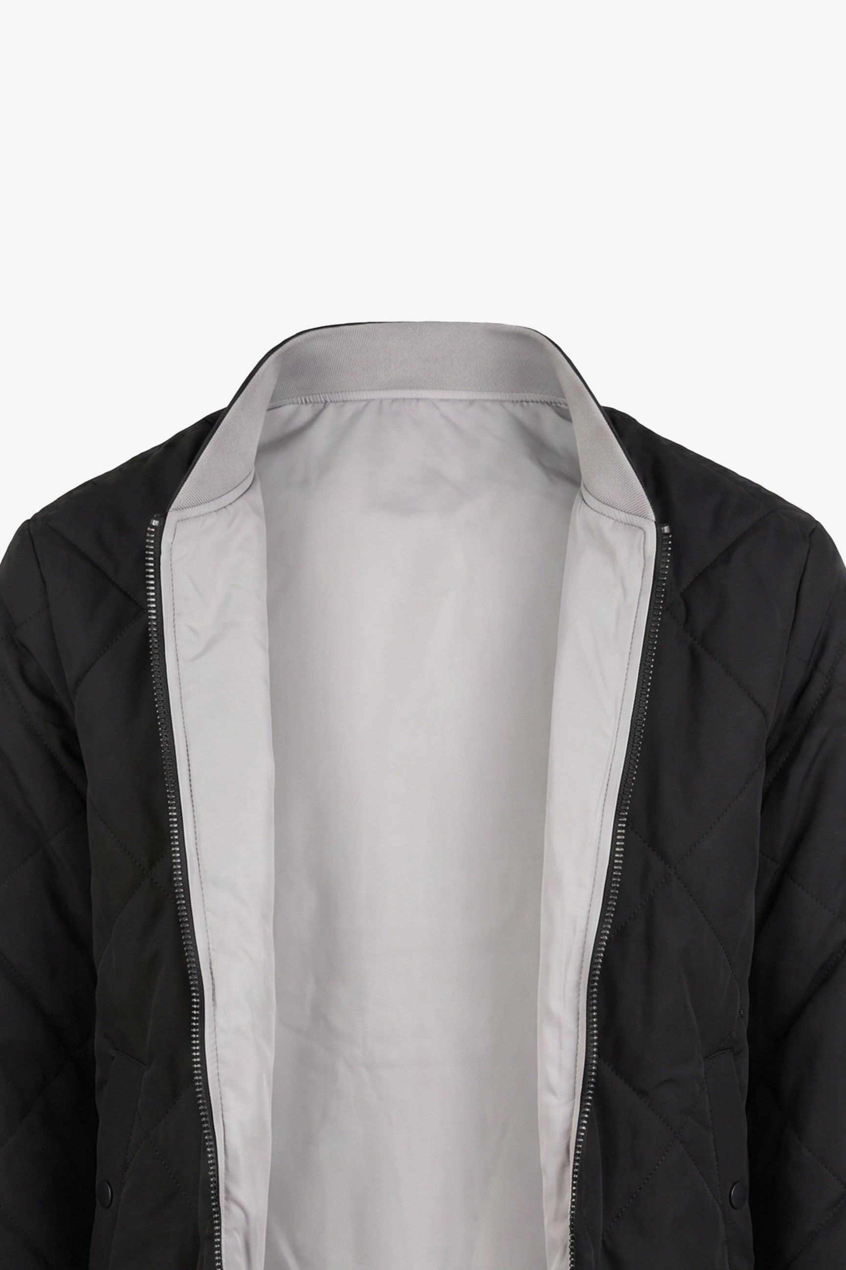 Chaqueta bomber acolchada ligera reversible 2 en 1 para hombre, color negro y beige.