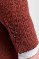 Traje de tres piezas de tweed con estampado de espiga color óxido