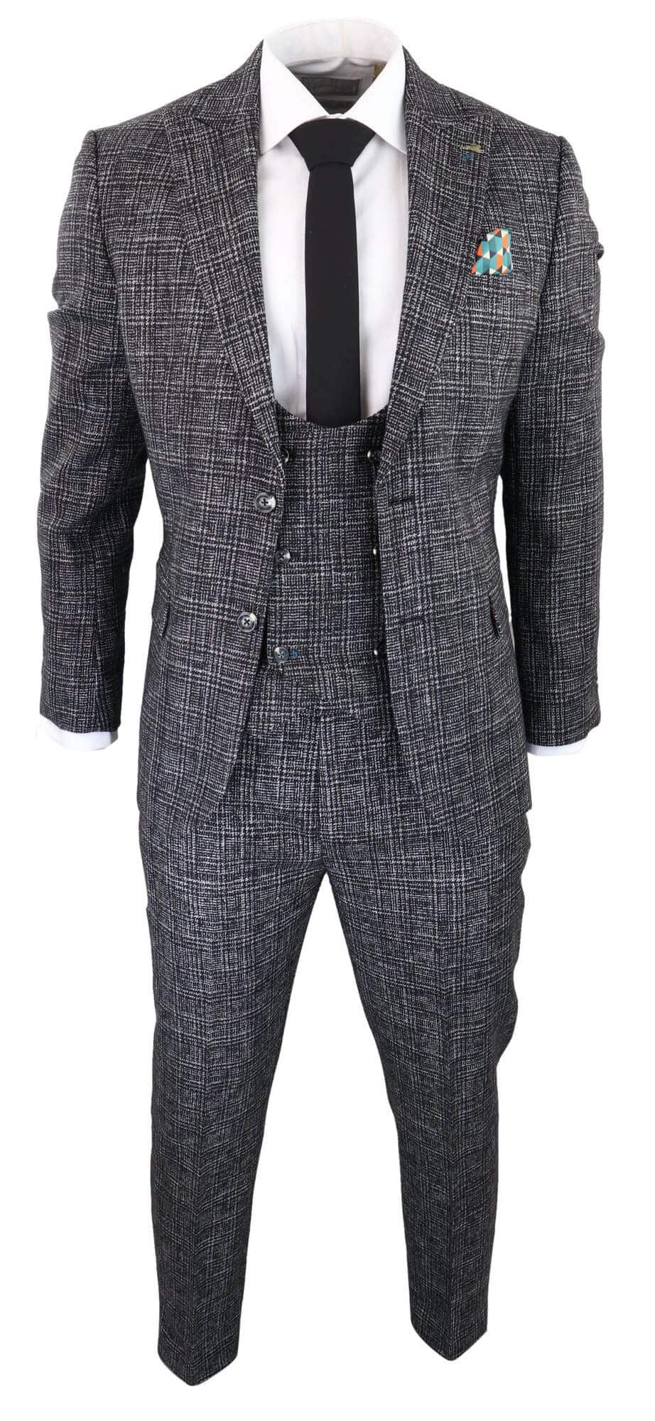 Traje de tres piezas para hombre en gris carbón a cuadros.