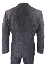 Traje de tres piezas para hombre en gris carbón a cuadros.