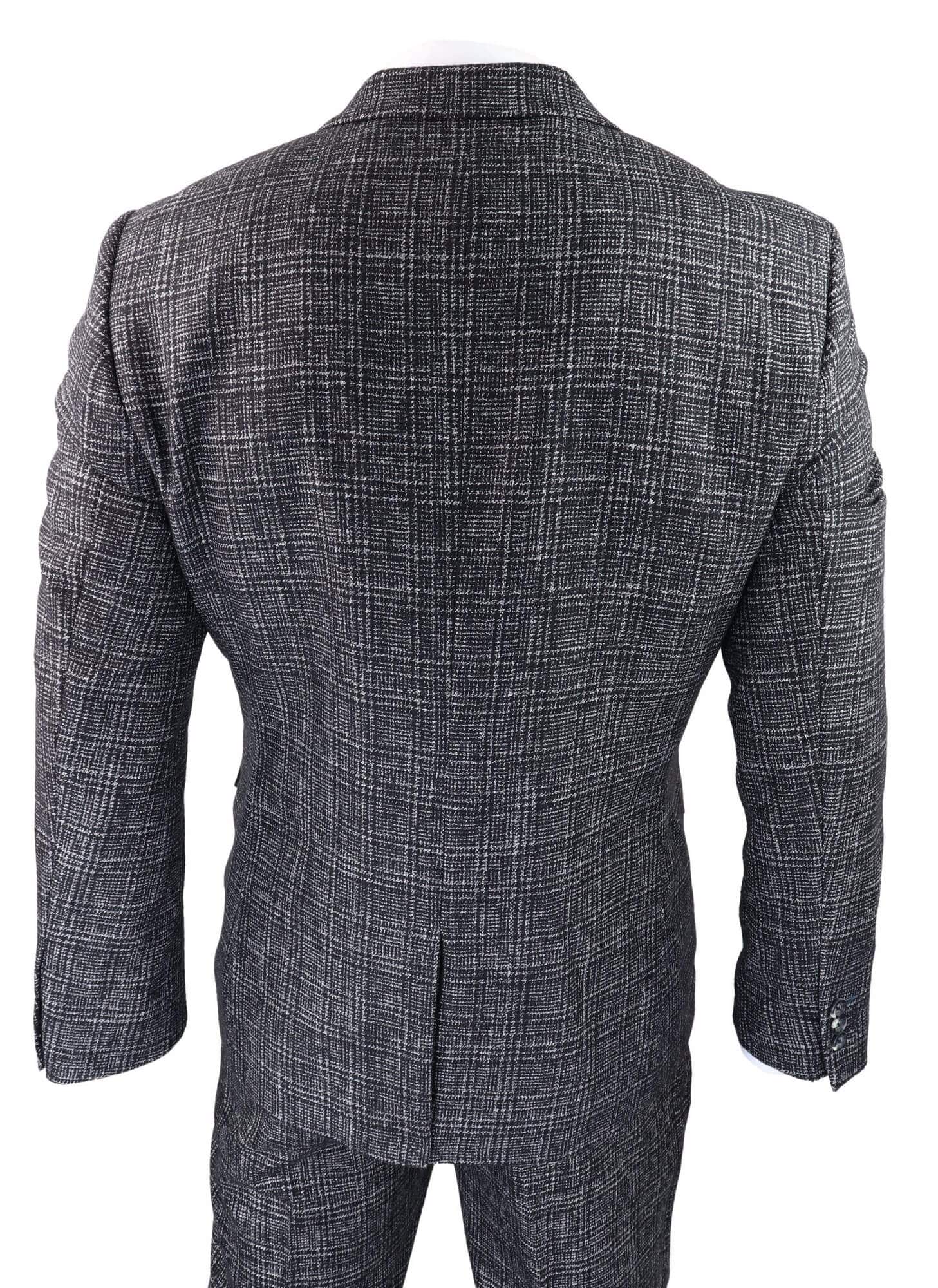 Traje de tres piezas para hombre en gris carbón a cuadros.