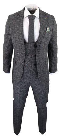 Traje de tres piezas para hombre en color gris carbón.