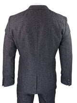 Traje de tres piezas para hombre en color gris carbón.