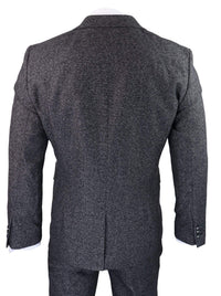 Traje de tres piezas para hombre en color gris carbón.