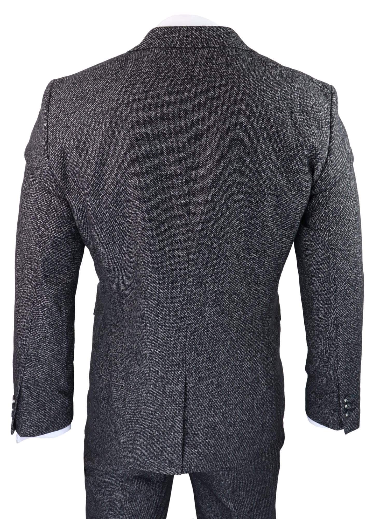 Traje de tres piezas para hombre en color gris carbón.