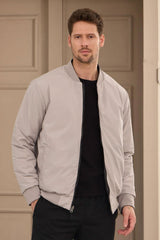 Chaqueta bomber acolchada ligera reversible 2 en 1 para hombre, color negro y beige.