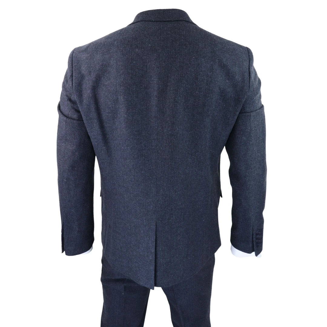 Traje de tres piezas para hombre de tweed azul con estampado de espiga.