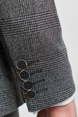 Traje de tres piezas para hombre, color gris con estampado de cuadros Glen.
