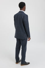 Traje de tres piezas para hombre con estampado de cuadros escoceses azules.