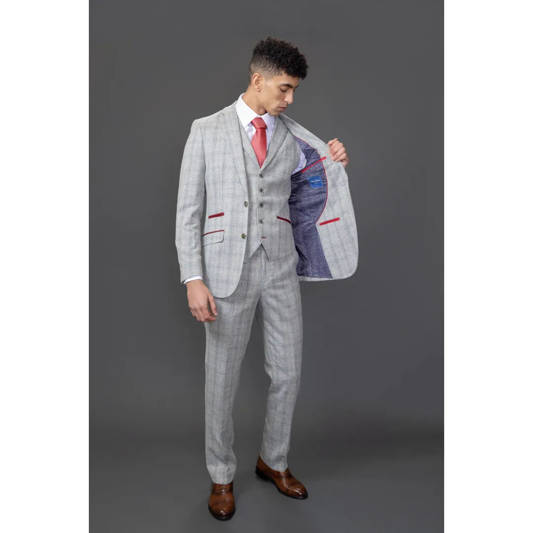 Traje de hombre Andrew de 3 piezas, gris a cuadros, corte ajustado con detalles rojos.