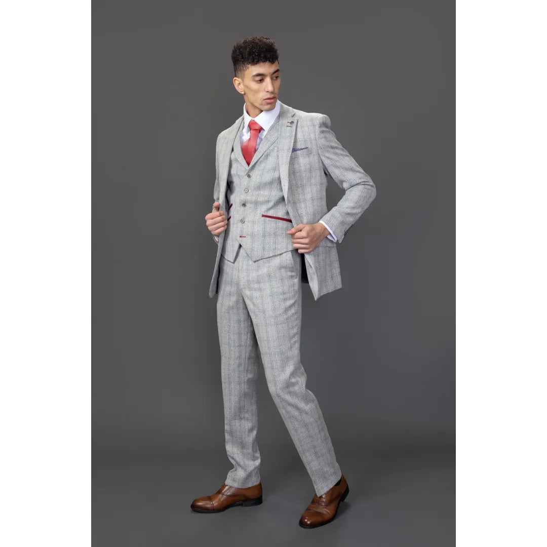 Traje de hombre Andrew de 3 piezas, gris a cuadros, corte ajustado con detalles rojos.