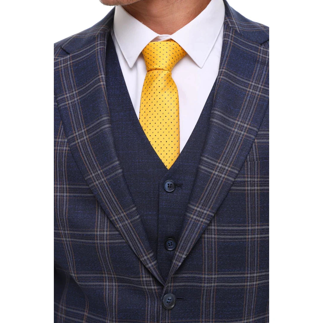 Traje de hombre de 3 piezas, azul marino, gris y marrón a cuadros, chaleco y pantalón en contraste.