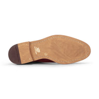 Botines Chelsea sin cordones para hombre de ante color camel.