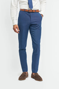Traje de boda de verano para hombre de lino azul cielo con pantalón azul marino.