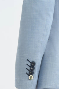 Traje de boda de verano para hombre de lino azul cielo con pantalón azul marino.