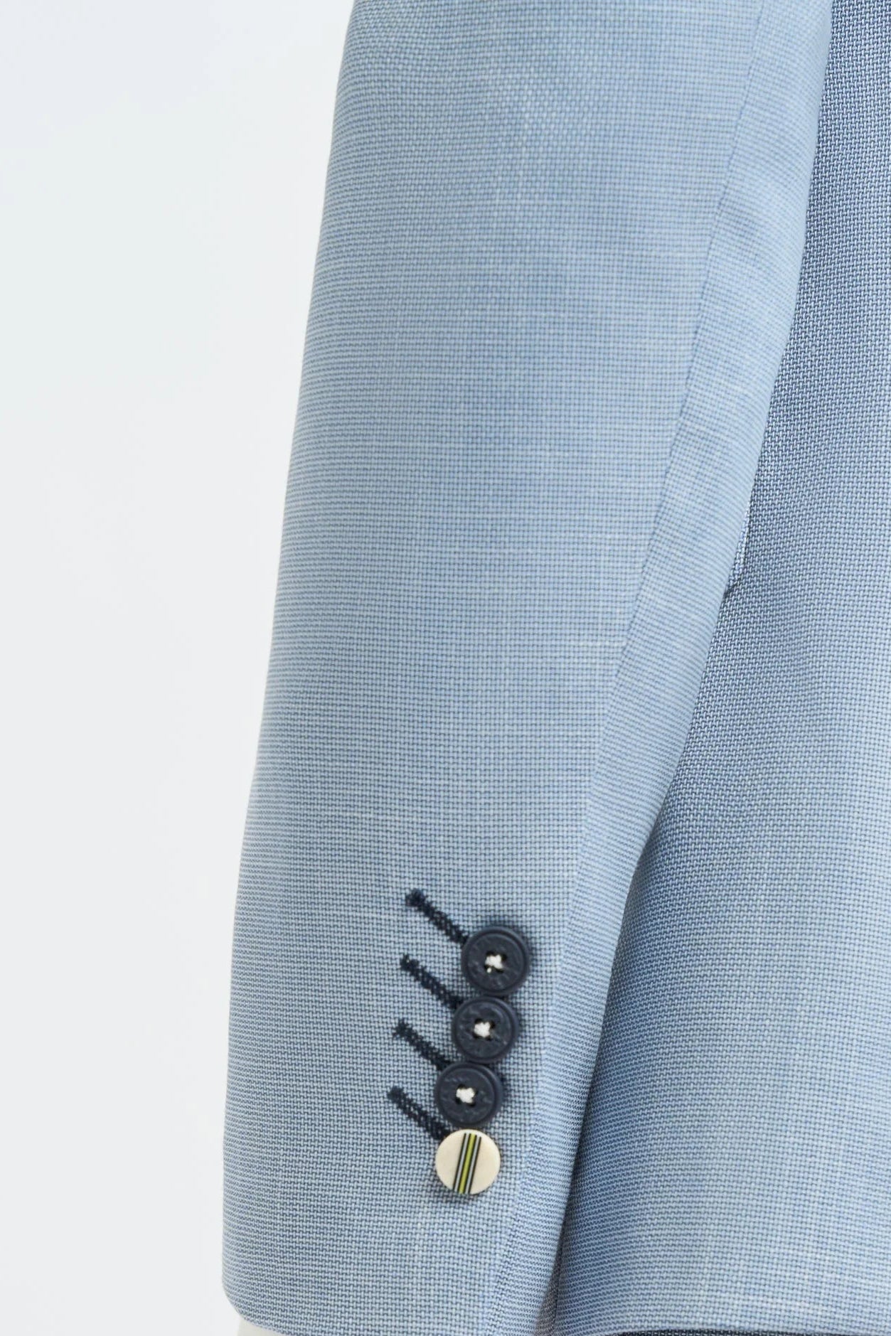 Traje de boda de verano para hombre de lino azul cielo con pantalón azul marino.