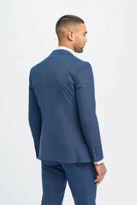 Traje de lino azul para hombre, ideal para verano.