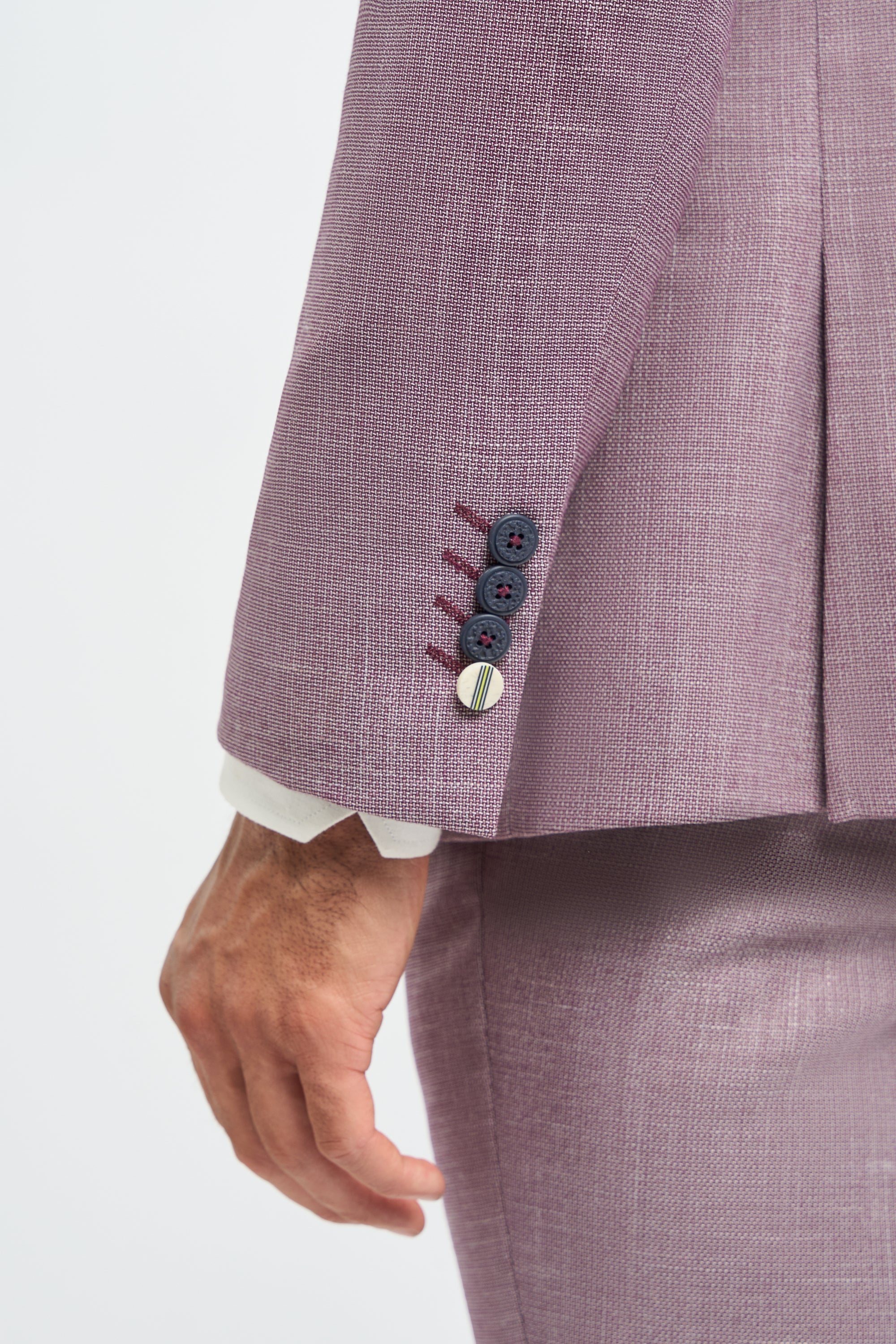 Traje de lino rosa palo para hombre, ideal para el verano.