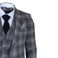 Traje de tres piezas para hombre de tweed gris a cuadros.