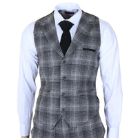 Traje de tres piezas para hombre de tweed gris a cuadros.