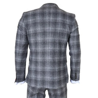 Traje de tres piezas para hombre de tweed gris a cuadros.