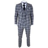 Traje de tres piezas para hombre de tweed gris a cuadros.