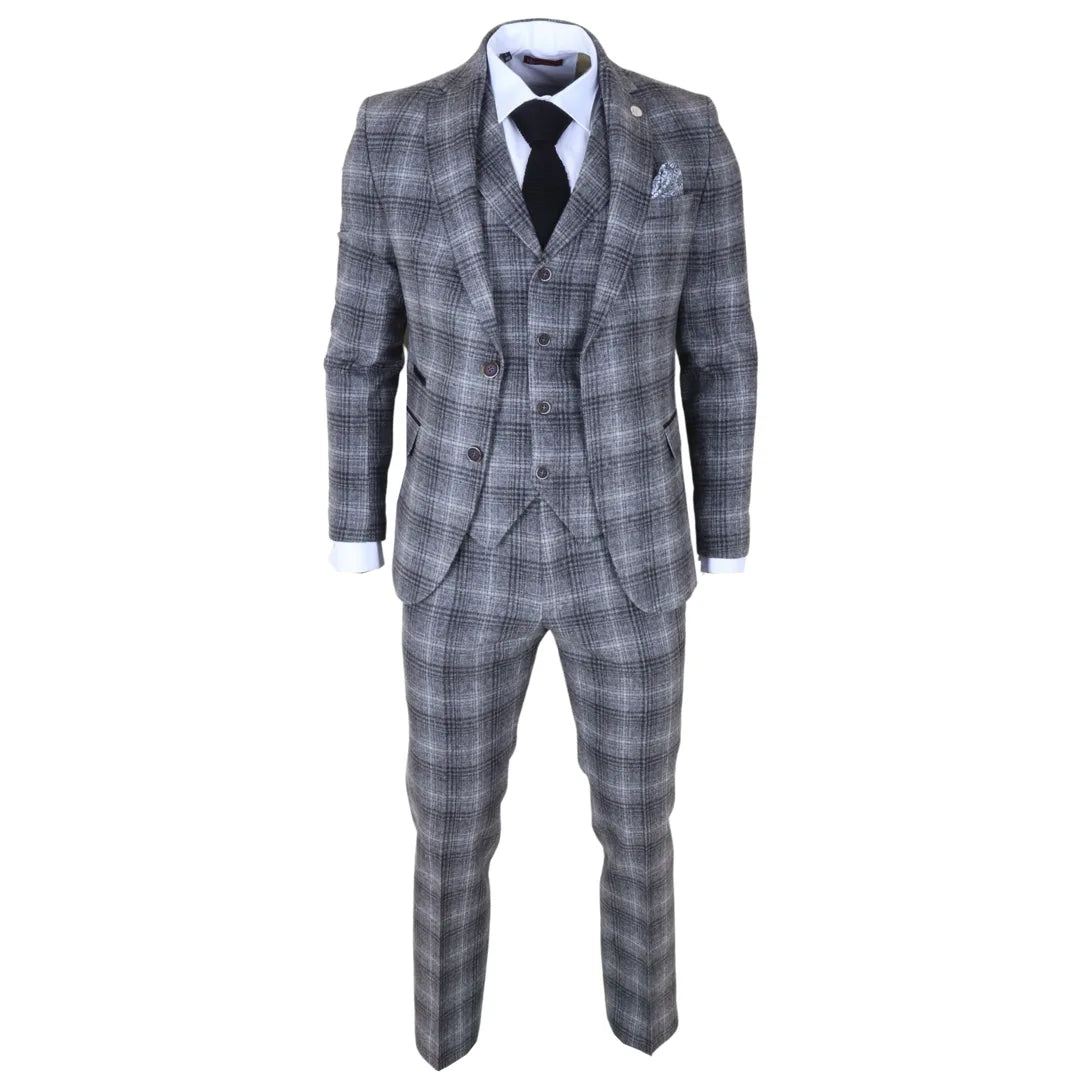 Traje de tres piezas para hombre de tweed gris a cuadros.