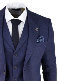 Traje de tres piezas para hombre de tweed azul marino con estampado de espiga.