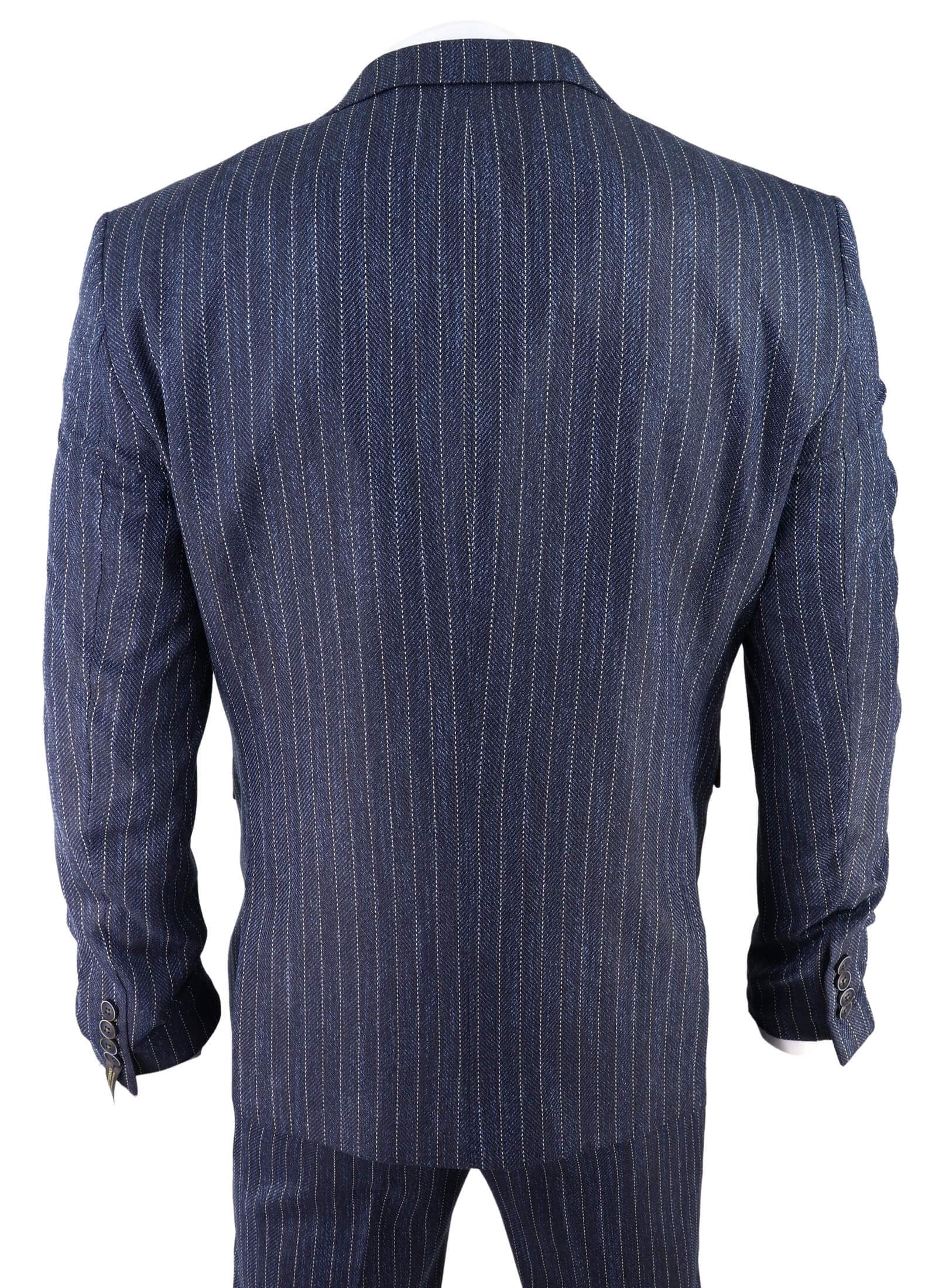 Traje de tres piezas para hombre de tweed azul con raya diplomática y estampado de espiga.