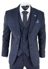 Traje de tres piezas para hombre con estampado de cuadros escoceses azules.