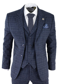 Traje de tres piezas para hombre con estampado de cuadros escoceses azules.