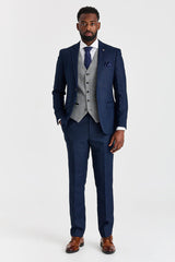 Traje azul marino Arthur con chaleco de tweed gris Harris en contraste.