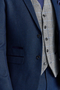Traje azul marino Arthur con chaleco de tweed gris Harris en contraste.