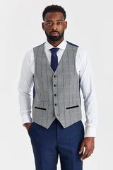 Traje azul marino Arthur con chaleco de tweed gris Harris en contraste.