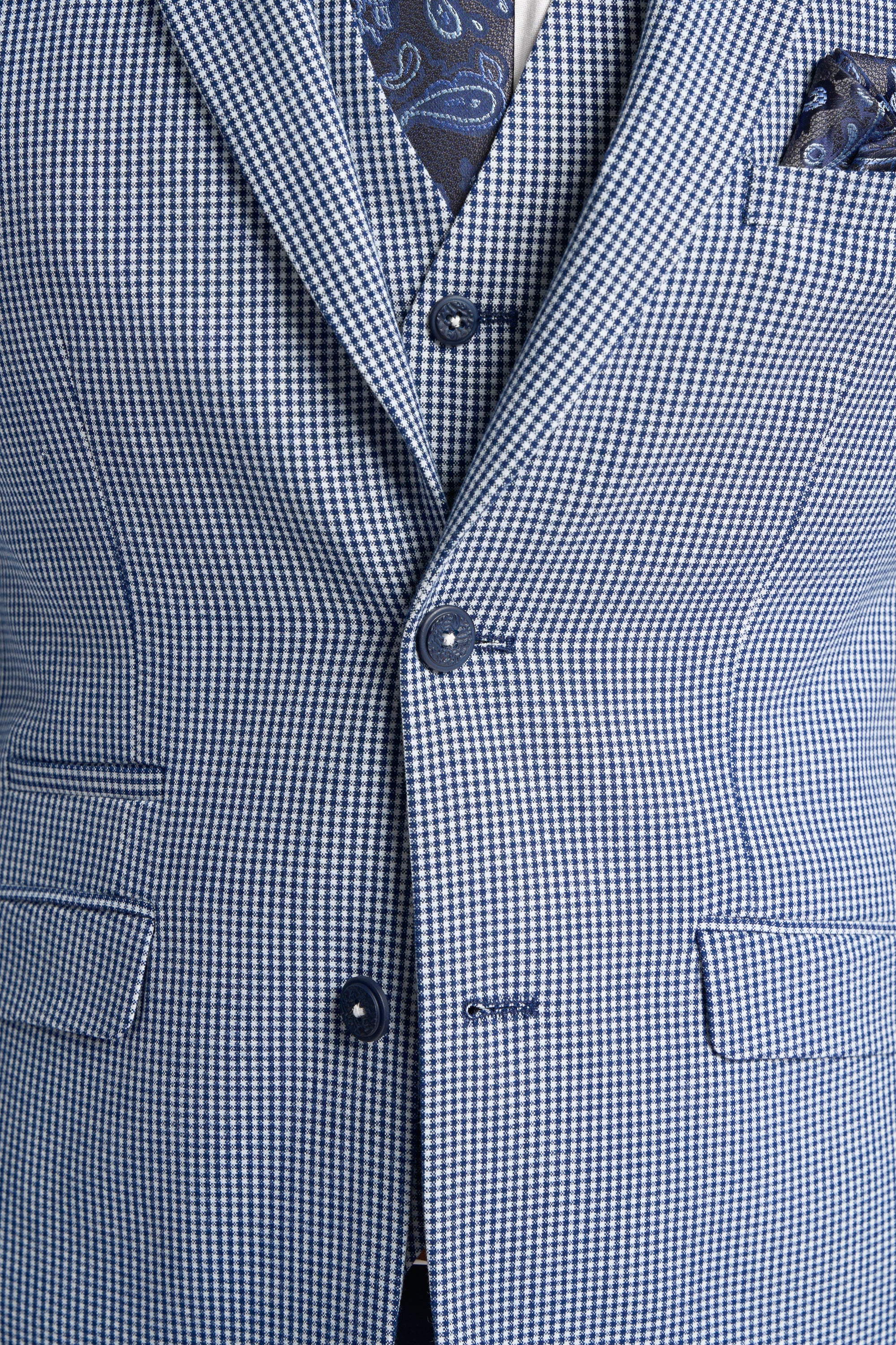 Traje de verano clásico de tres piezas para hombre de Baresi, en gris y azul marino con estampado a cuadros contrastantes.