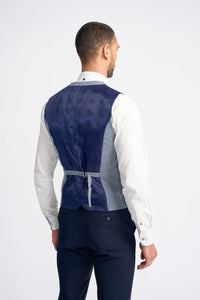 Traje de verano clásico de tres piezas para hombre de Baresi, en gris y azul marino con estampado a cuadros contrastantes.
