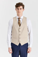 Traje azul marino Belmont con chaleco beige Belmont en contraste.