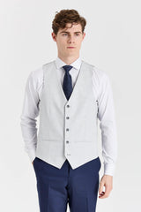 Traje azul marino Belmont con chaleco plateado Belmont en contraste.