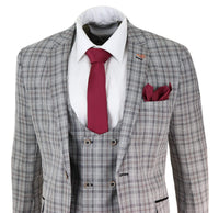 Traje de tres piezas para hombre, de tweed gris a cuadros.