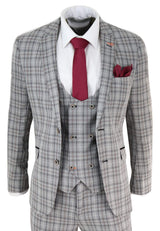 Traje de tres piezas para hombre, de tweed gris a cuadros.