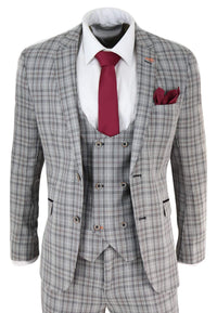 Traje de tres piezas para hombre, de tweed gris a cuadros.