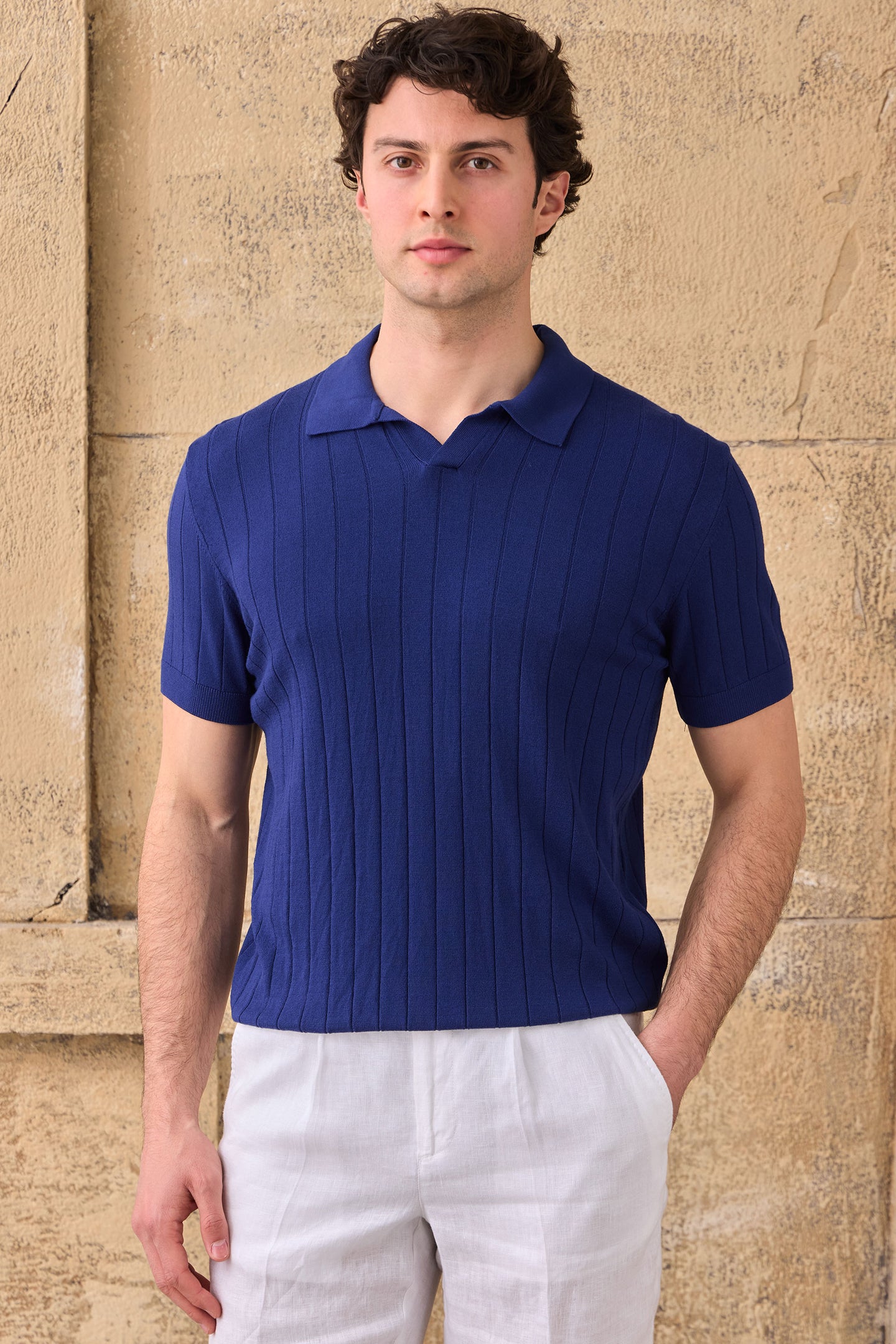 Polo de punto acanalado azul marino para hombre