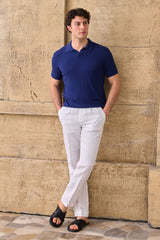 Polo de punto acanalado azul marino para hombre