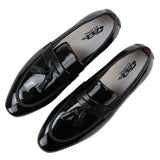 Mocasines negros de charol con borlas para hombre