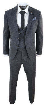 Traje de tres piezas de tweed gris
