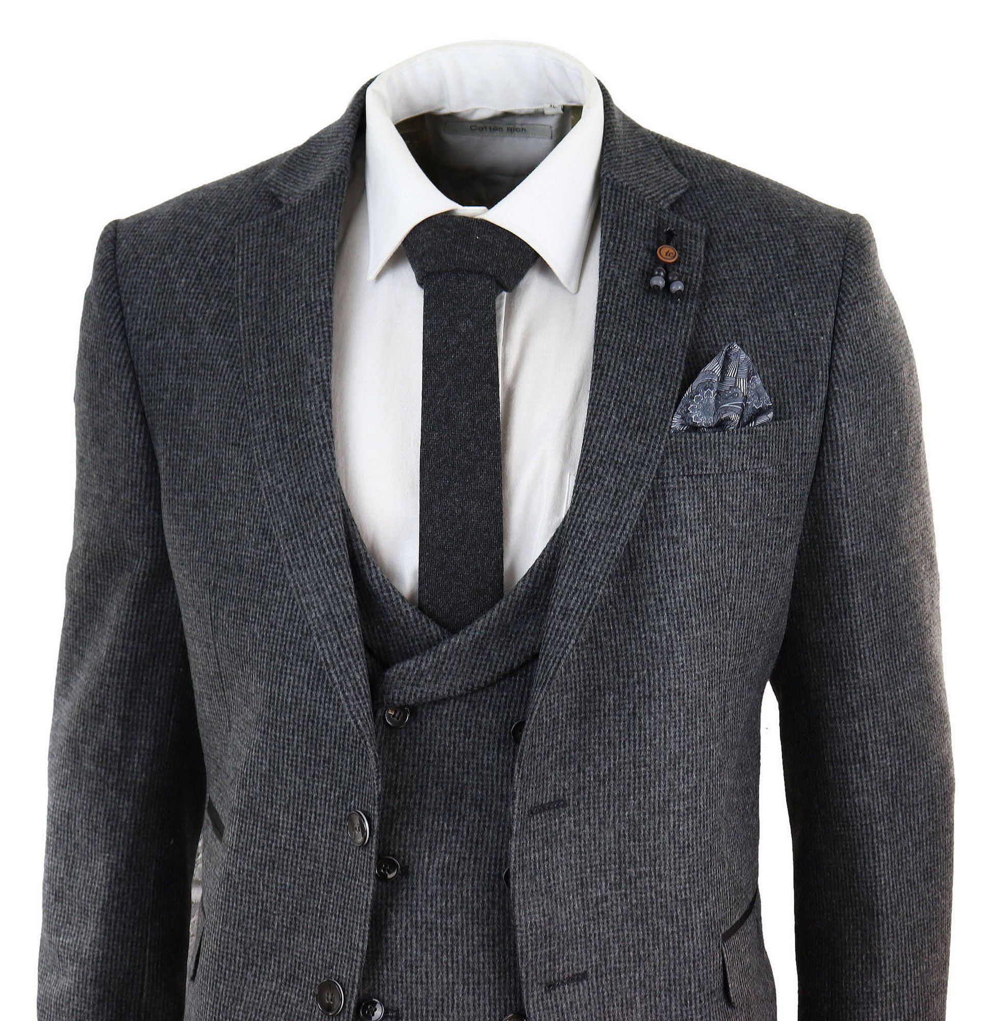 Traje de tres piezas de tweed gris