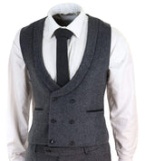 Traje de tres piezas de tweed gris