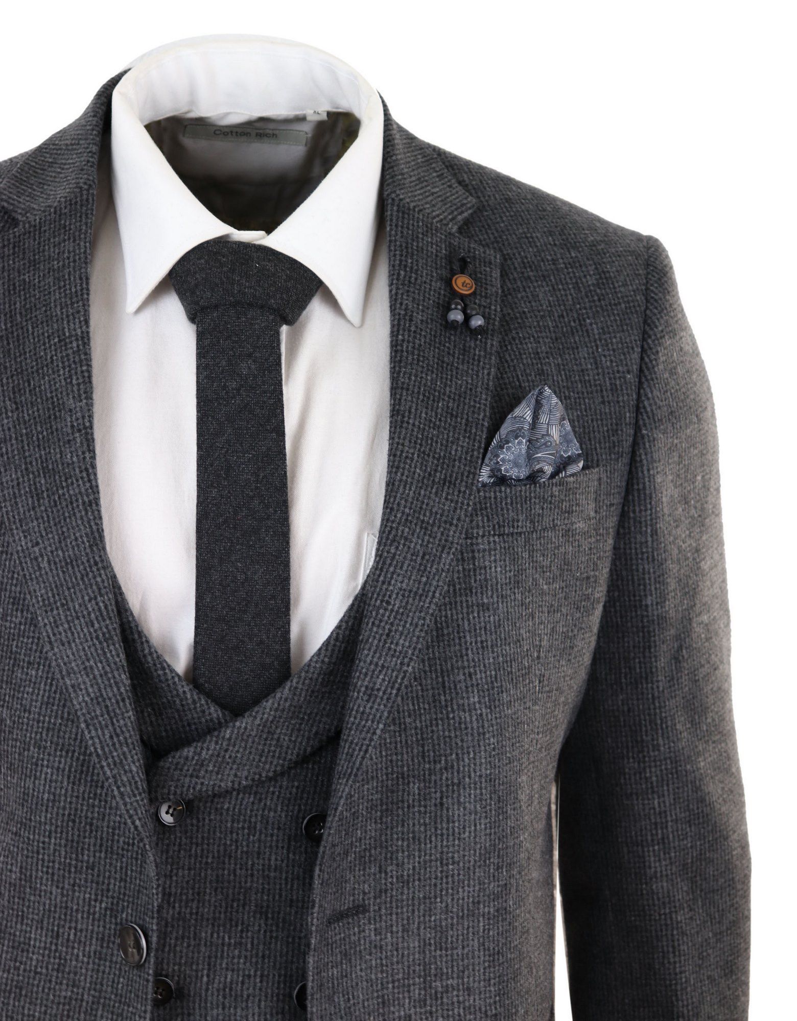 Traje de tres piezas de tweed gris