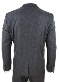 Traje de tres piezas de tweed gris